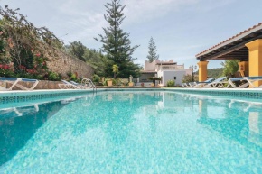 4 bedrooms villa with private pool jacuzzi and furnished garden at Santa Eularia des Riu
