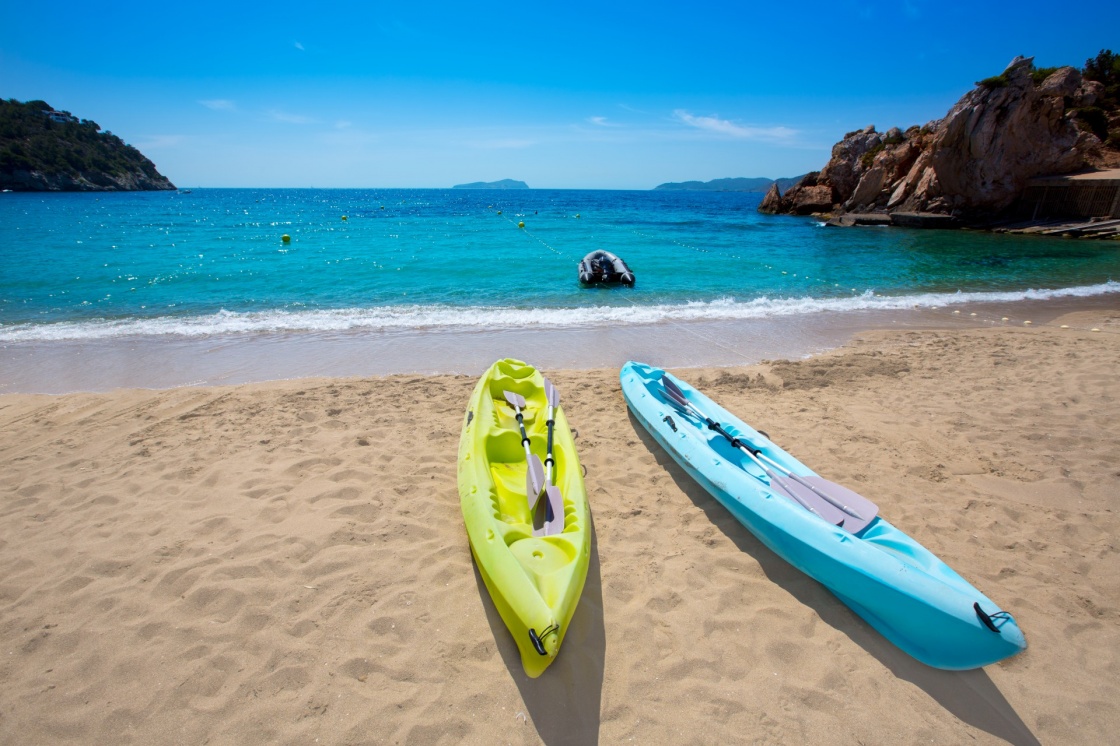 'Ibiza cala Sant Vicent beach with Kayaks san Juan at Balearic Islands of spain' - Ibiza